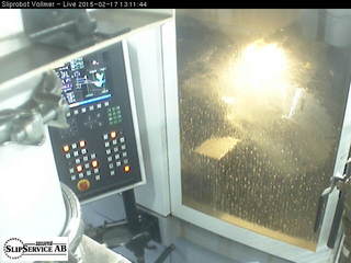 Vollmer Grinder with Robot Loader