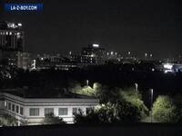 Skyline view of Topgolf entertainment venue.